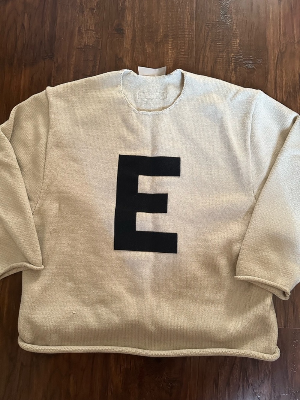 Fear of God Crewneck Sweater in Cream with Black 'E' Graphic